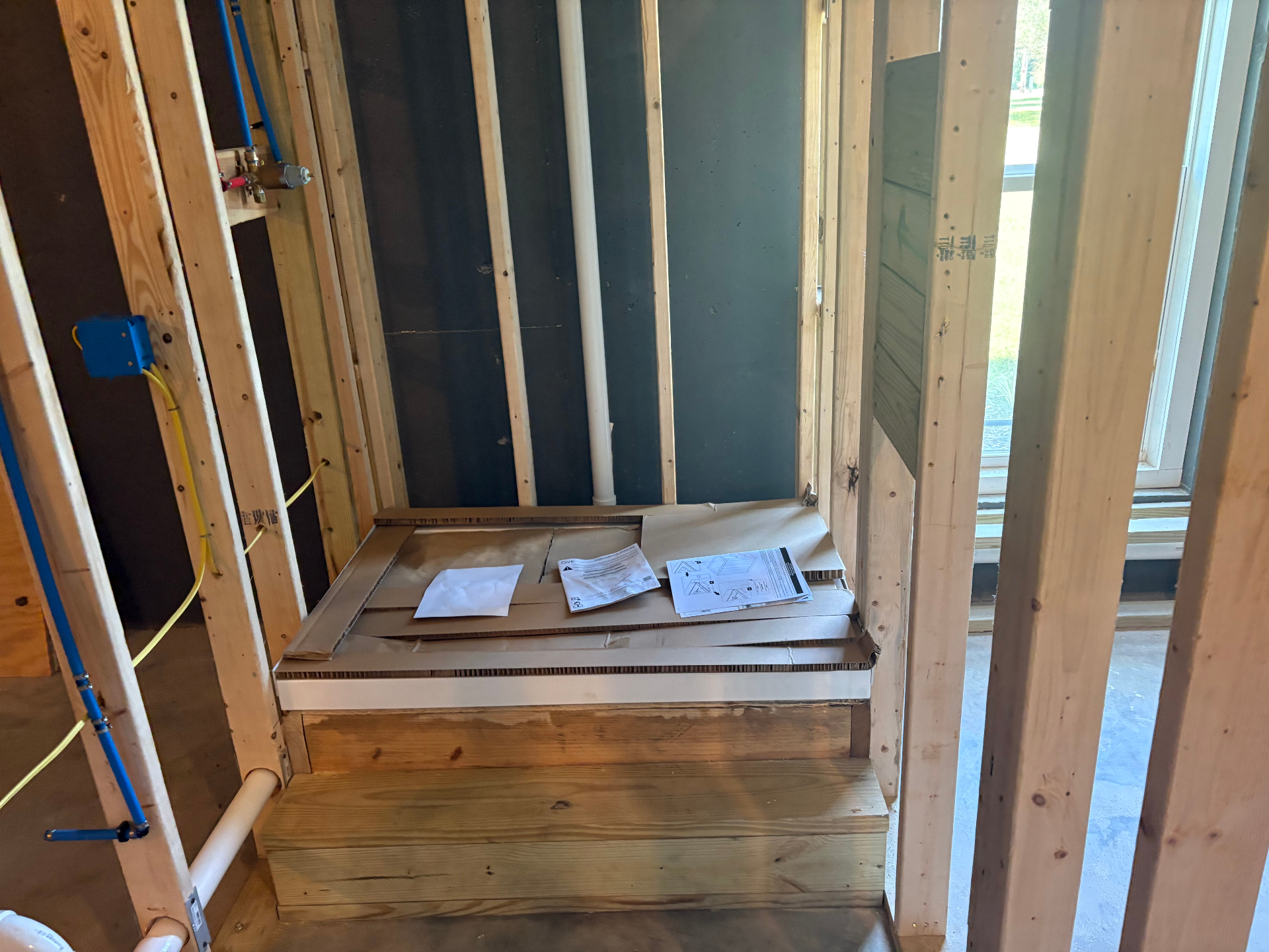 Finished bathroom - toilet and shower view - Cleveland, TN