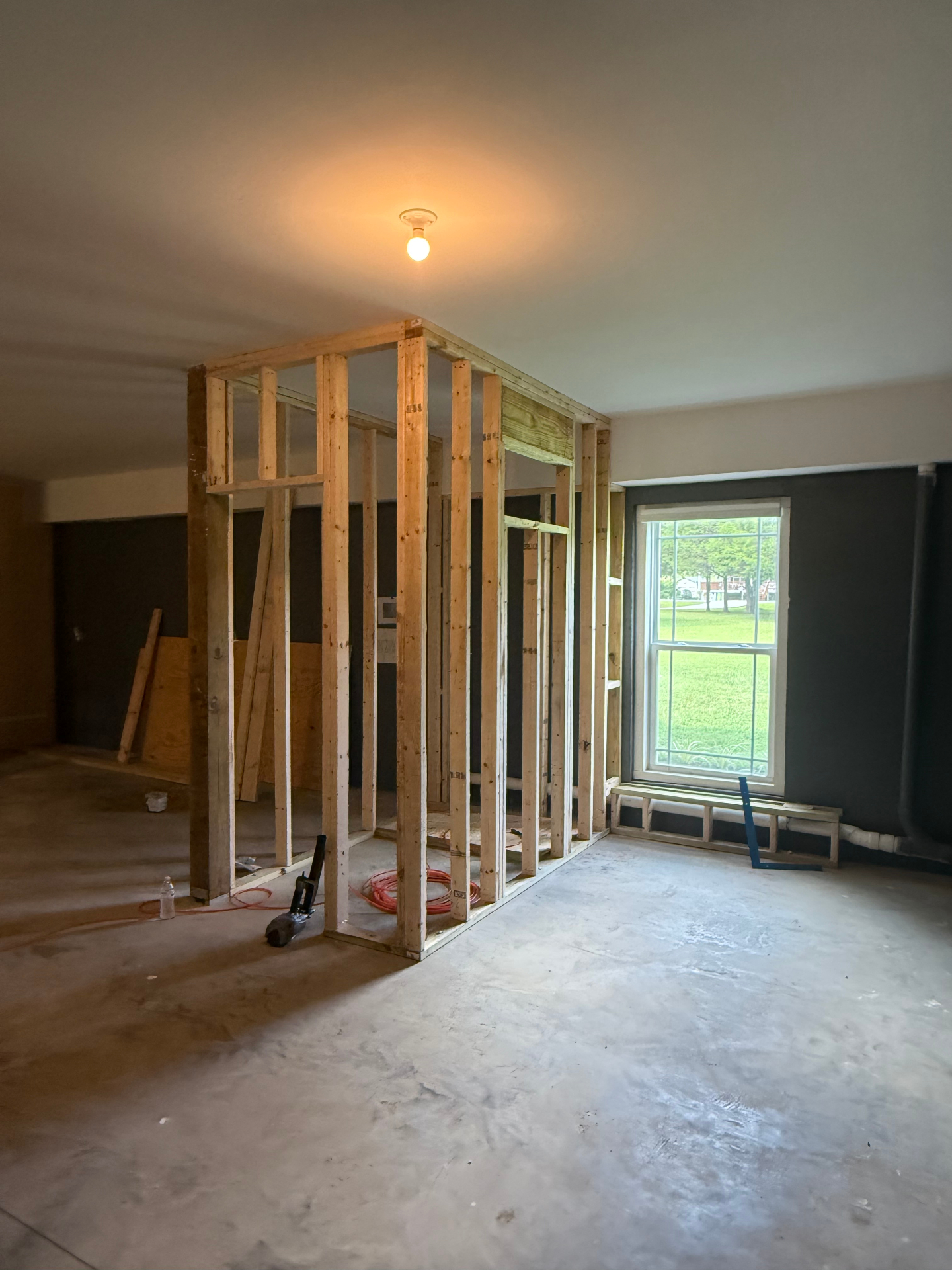 Bathroom framing with window - wide basement view - Cleveland, TN