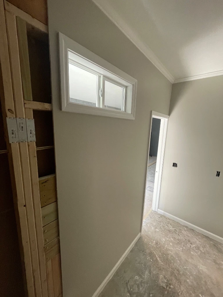 Hallway with transom window - framing visible at left - Cleveland, TN