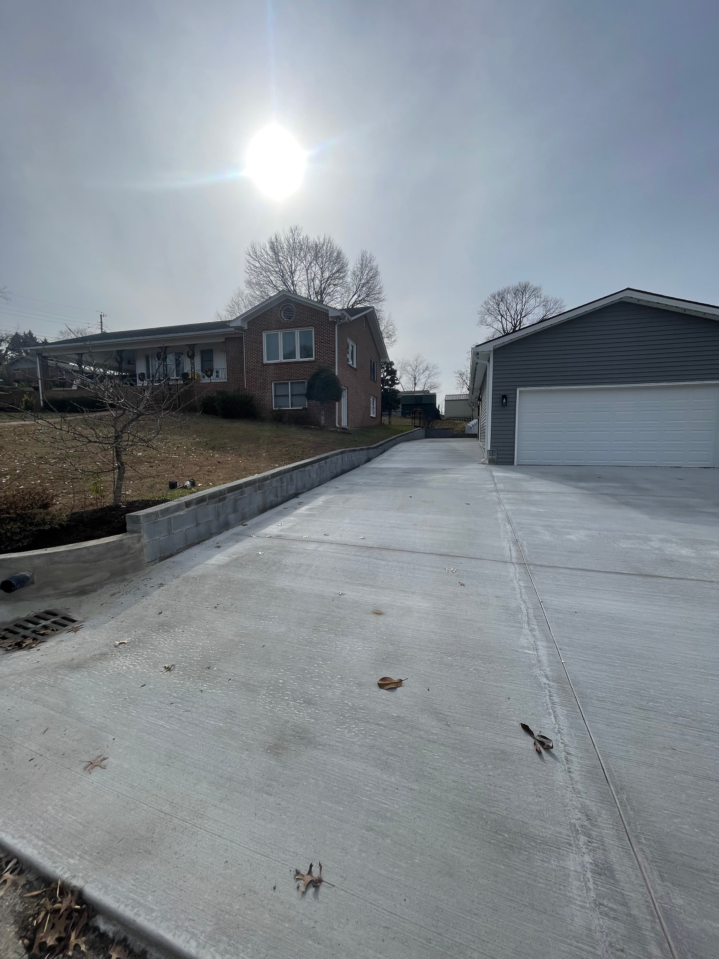Driveway and retaining wall - sunlit view - Cleveland, TN