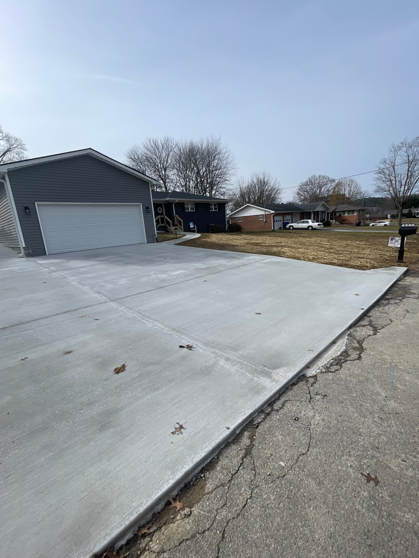 Finished driveway and garage addition by Integrity Construction - Cleveland TN