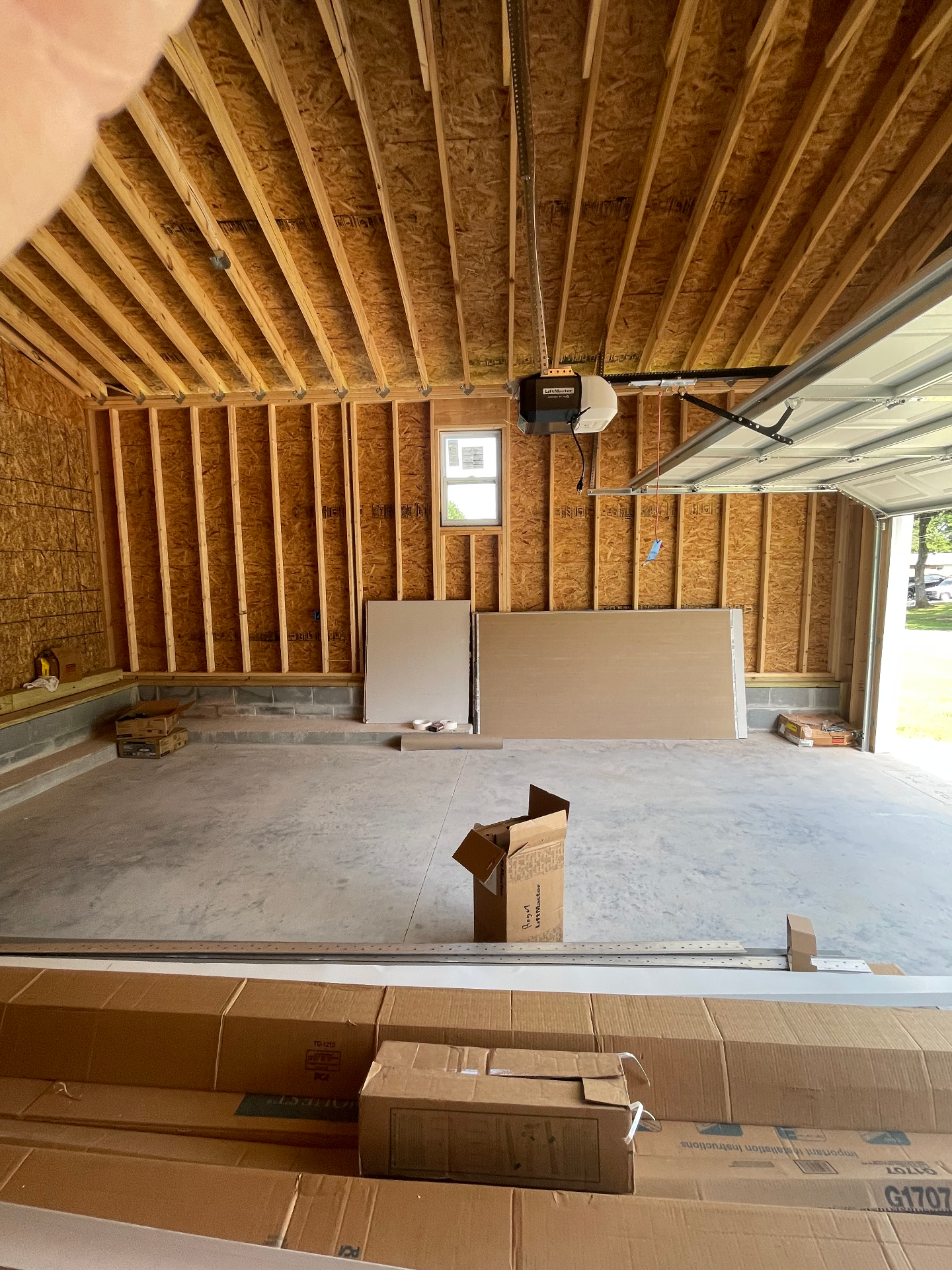 Garage interior - framing, opener, and drywall prep - Cleveland, TN
