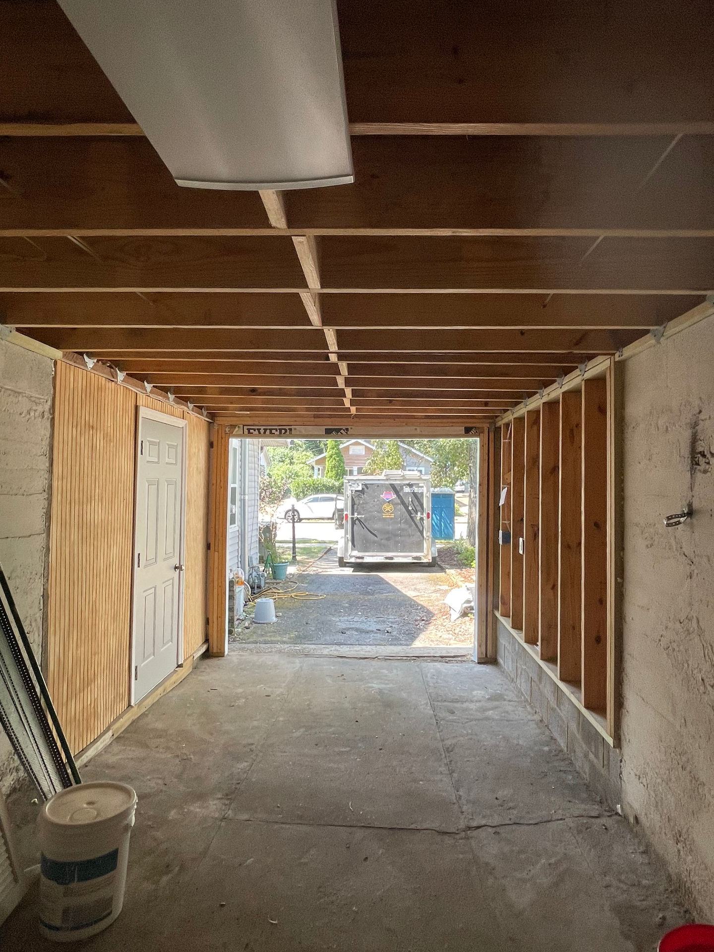 Garage interior looking out - framing and door access - Cleveland, TN