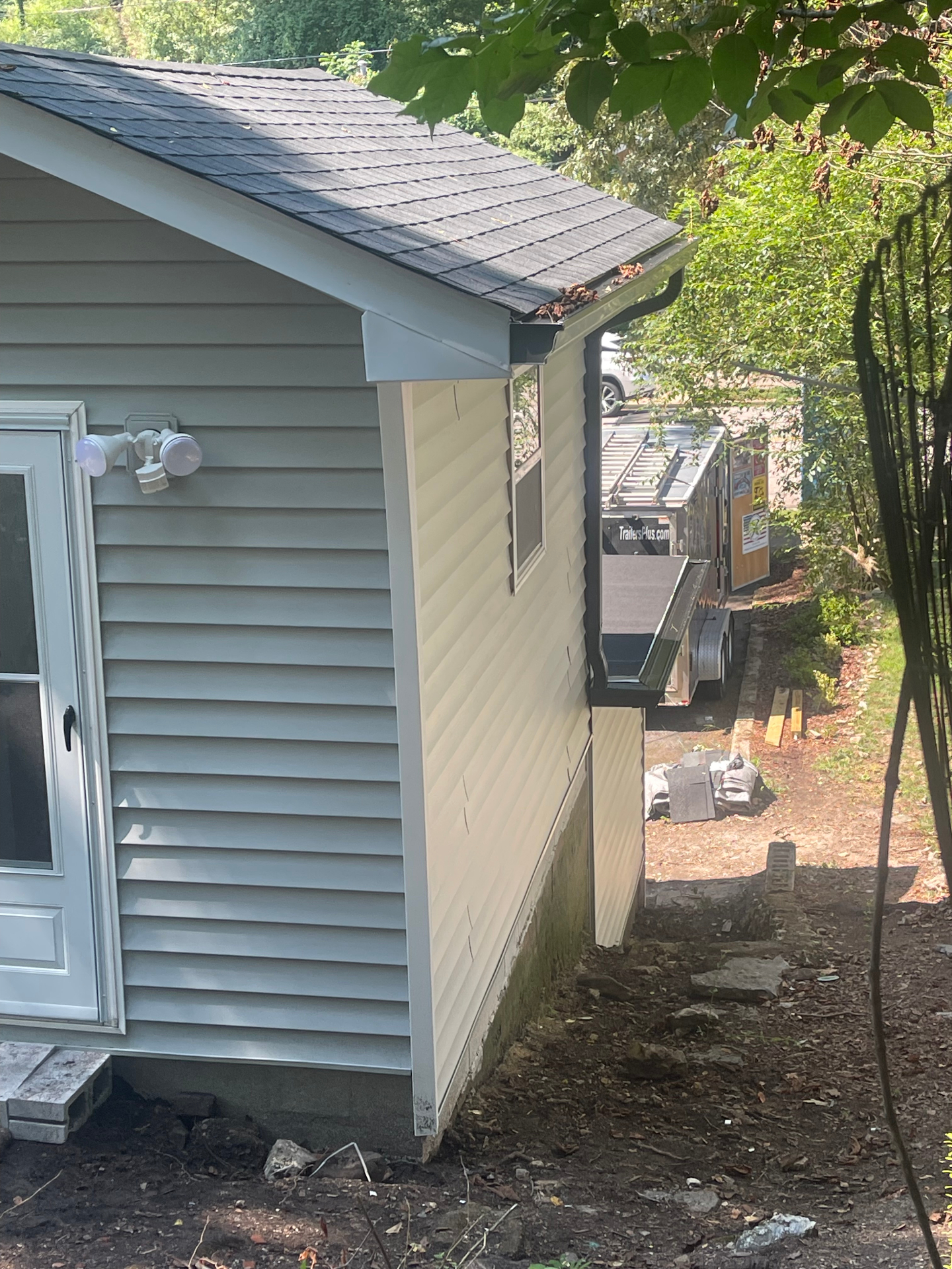 Siding and exterior lights - rear view - Cleveland, TN