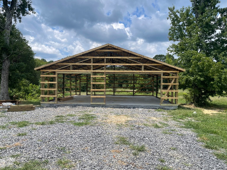 Post-frame structure with roof decking - front view - Cleveland, TN