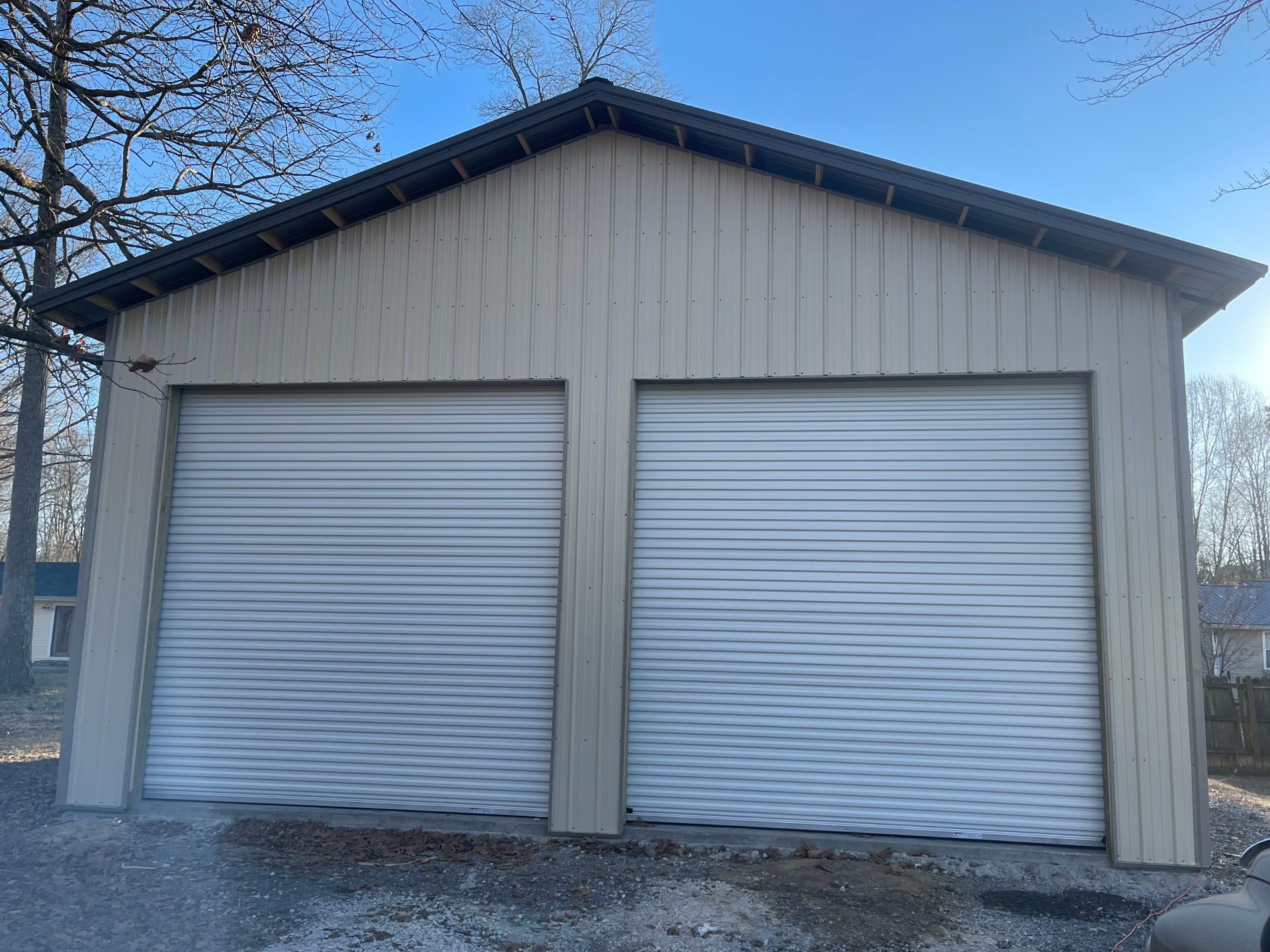 Rear exterior featuring double roll-up doors - Cleveland, TN