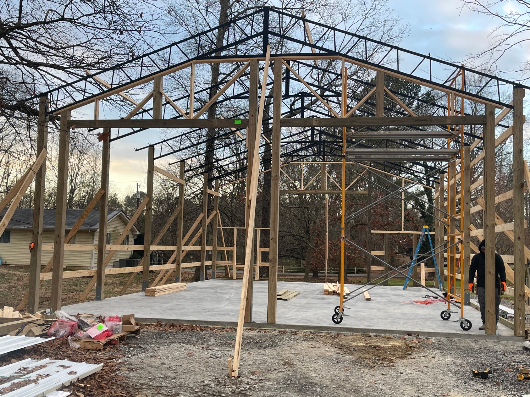 Framing and steel trusses - interior at dusk - Cleveland, TN