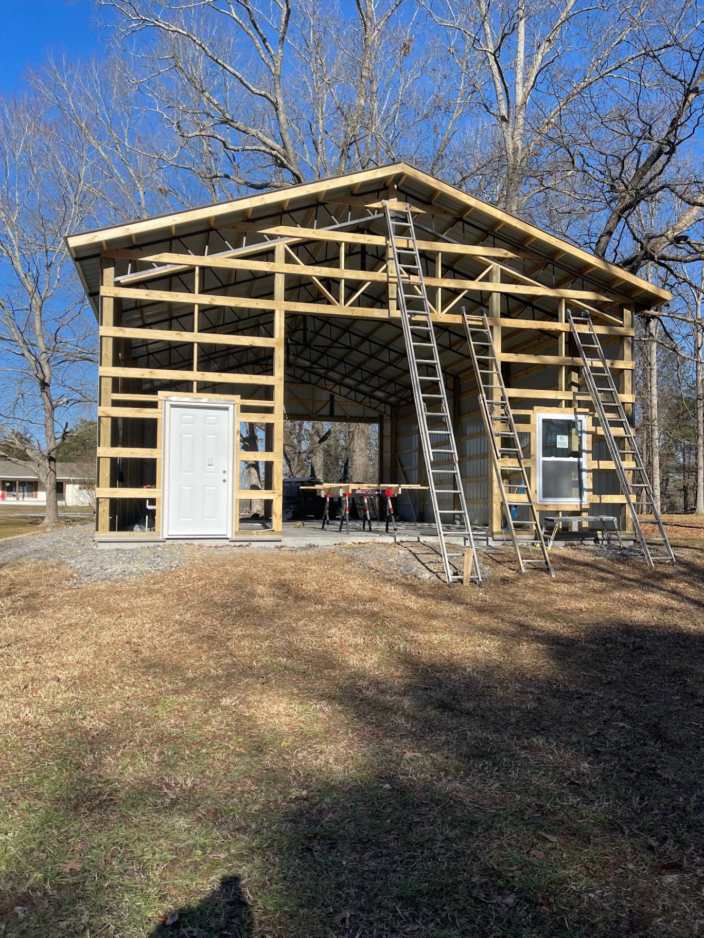 Framing with metal siding installation in progress - Cleveland, TN