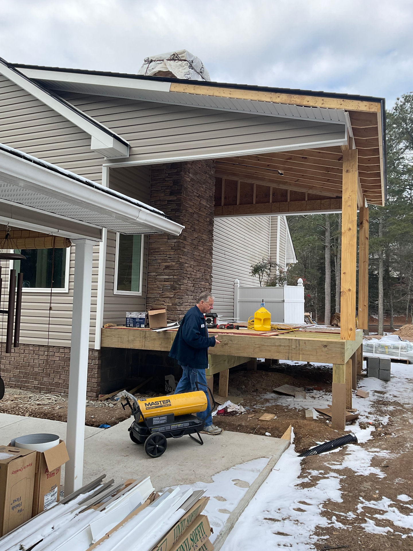 Covered deck with metal roof and stone chimney - Cleveland, TN