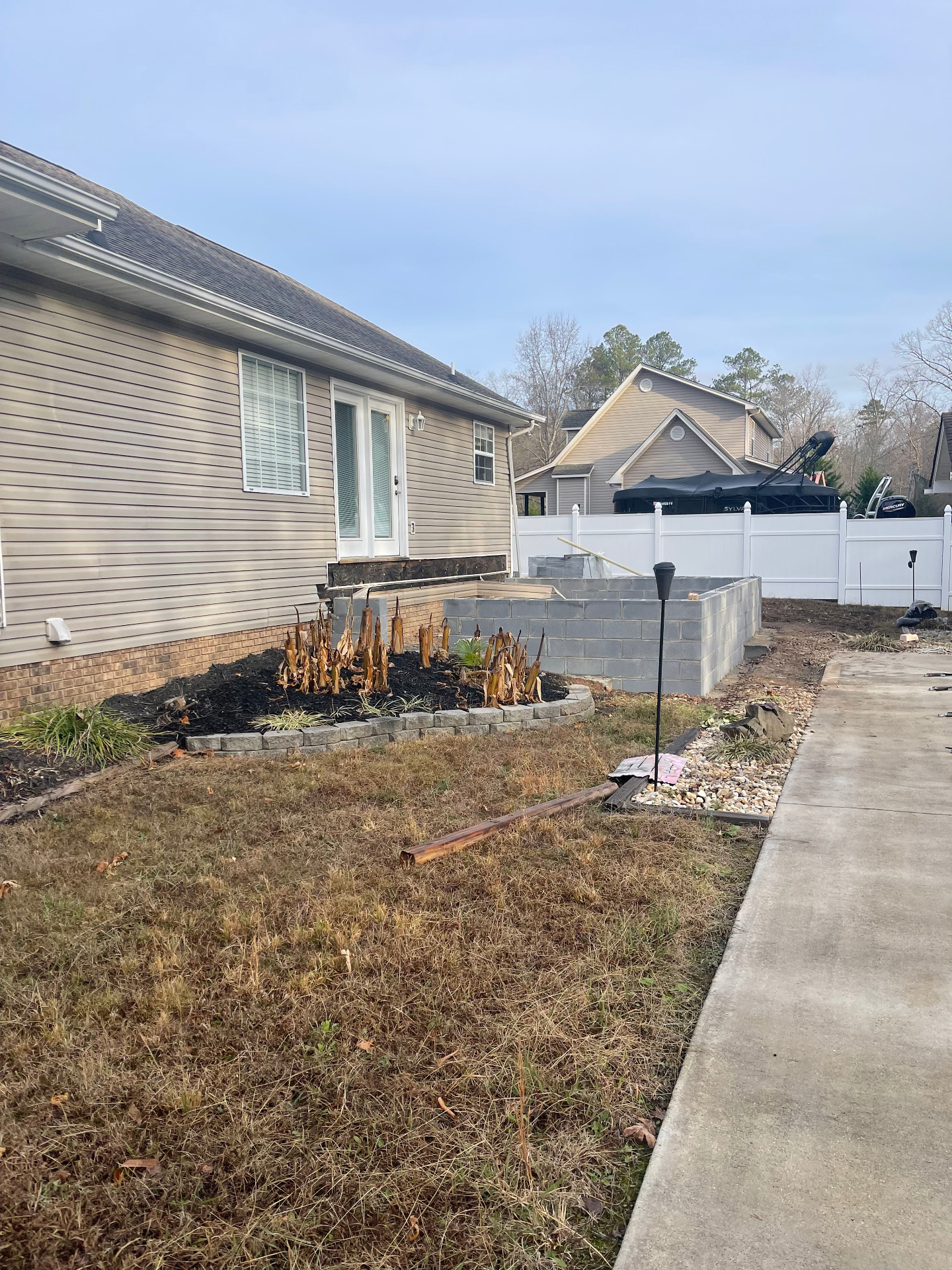 Side yard showing foundation block work in progress - Cleveland, TN