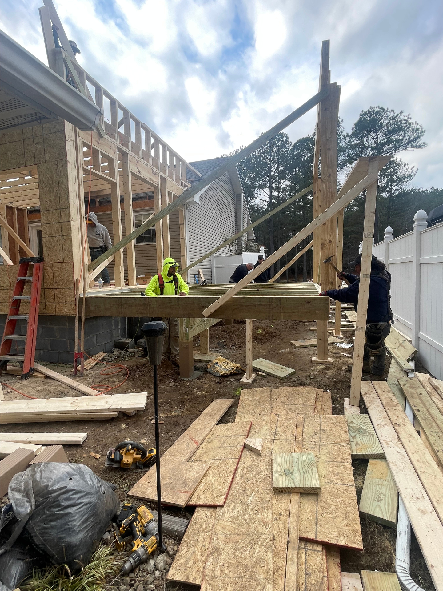 Crew framing walls and deck structure - Cleveland, TN