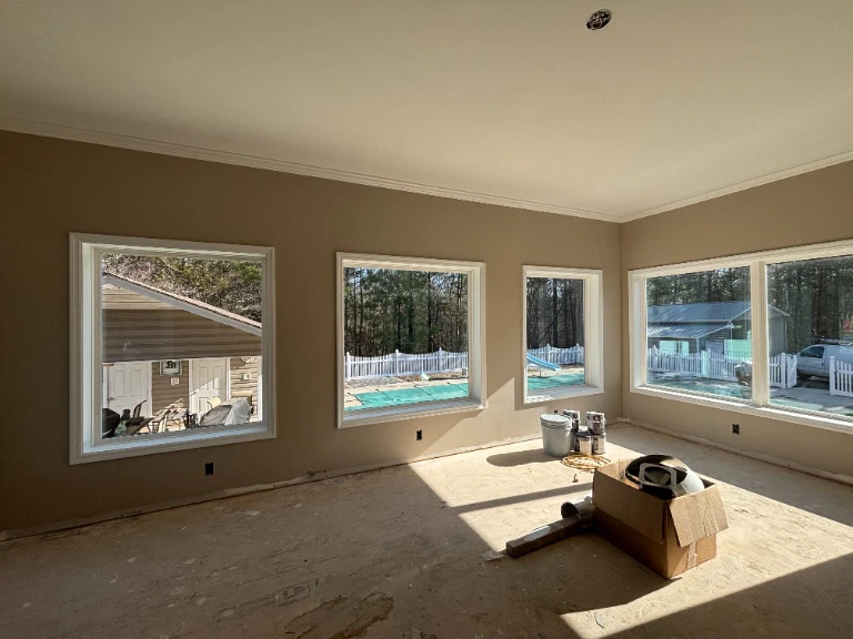 Sunroom interior - windows installed, painting in progress - Cleveland, TN